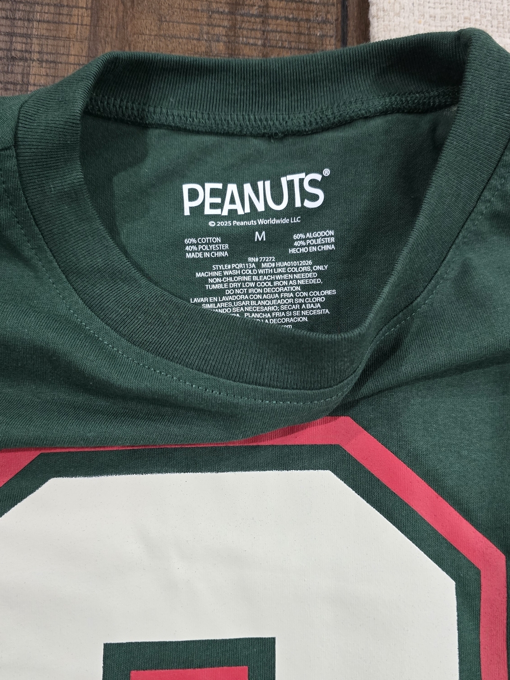 Peanuts Dark Green Short Sleeve Tee with White & Pink Graphic